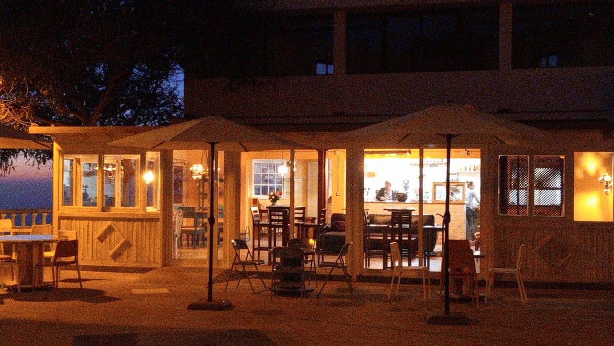 Camu Camu restaurant illuminated at night in Las Tricias